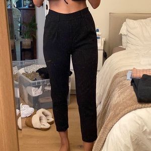 black high-waisted trousers